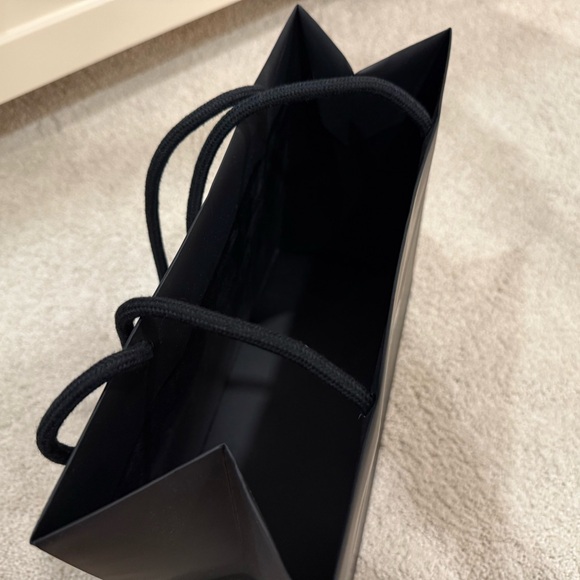 CHANEL Black Paper Bag with White Floral Detail - Picture 5 of 6
